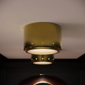 Moderne 10" flush mount in unlacquered brass on a dark ceiling