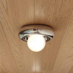 Bulles 14" alabaster flush mount in polished nickel on a warm wood ceiling