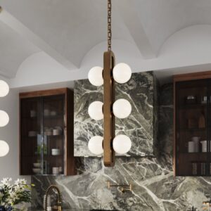 Rio 36" opal globe pendant in unlacquered brass in front of a grey marble range hood