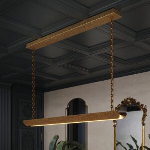 Manhattan hammered linear suspension in unlacquered brass under a dark coffered ceiling