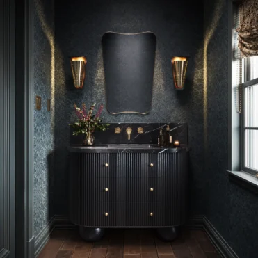 Bath vanity with a pair of sconces